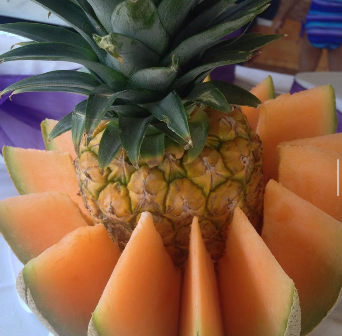 Pineapple and melon fruit centerpiece