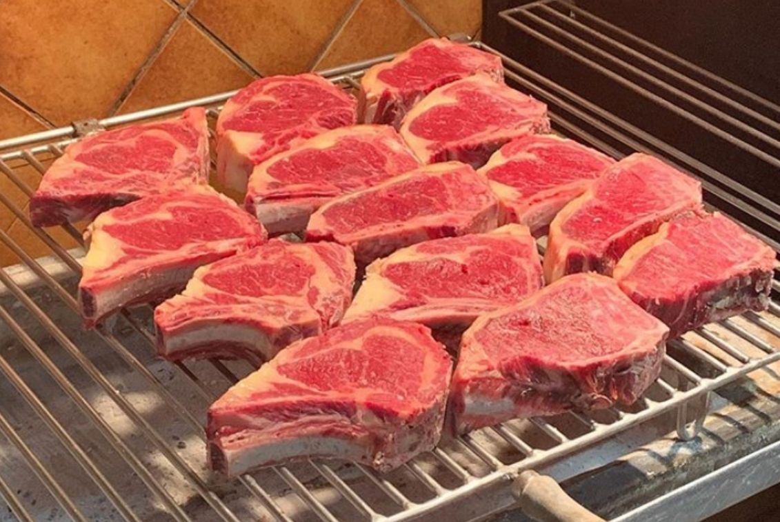 Premium raw steaks on the rack